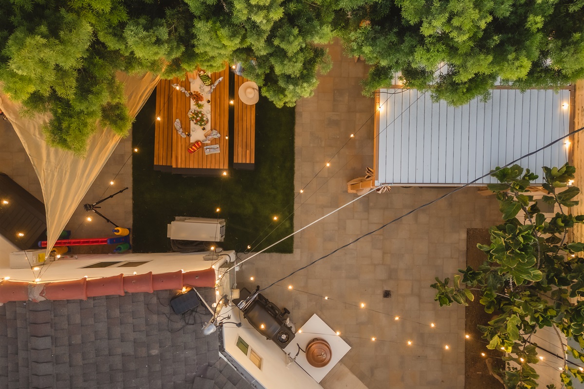 From grilling and dining under twinkling string lights to soaking in the hot tub or enjoying s’mores by the fire, this cozy San Diego backyard was made for memory-making. Kids can play while grown-ups relax, all in one inviting space.