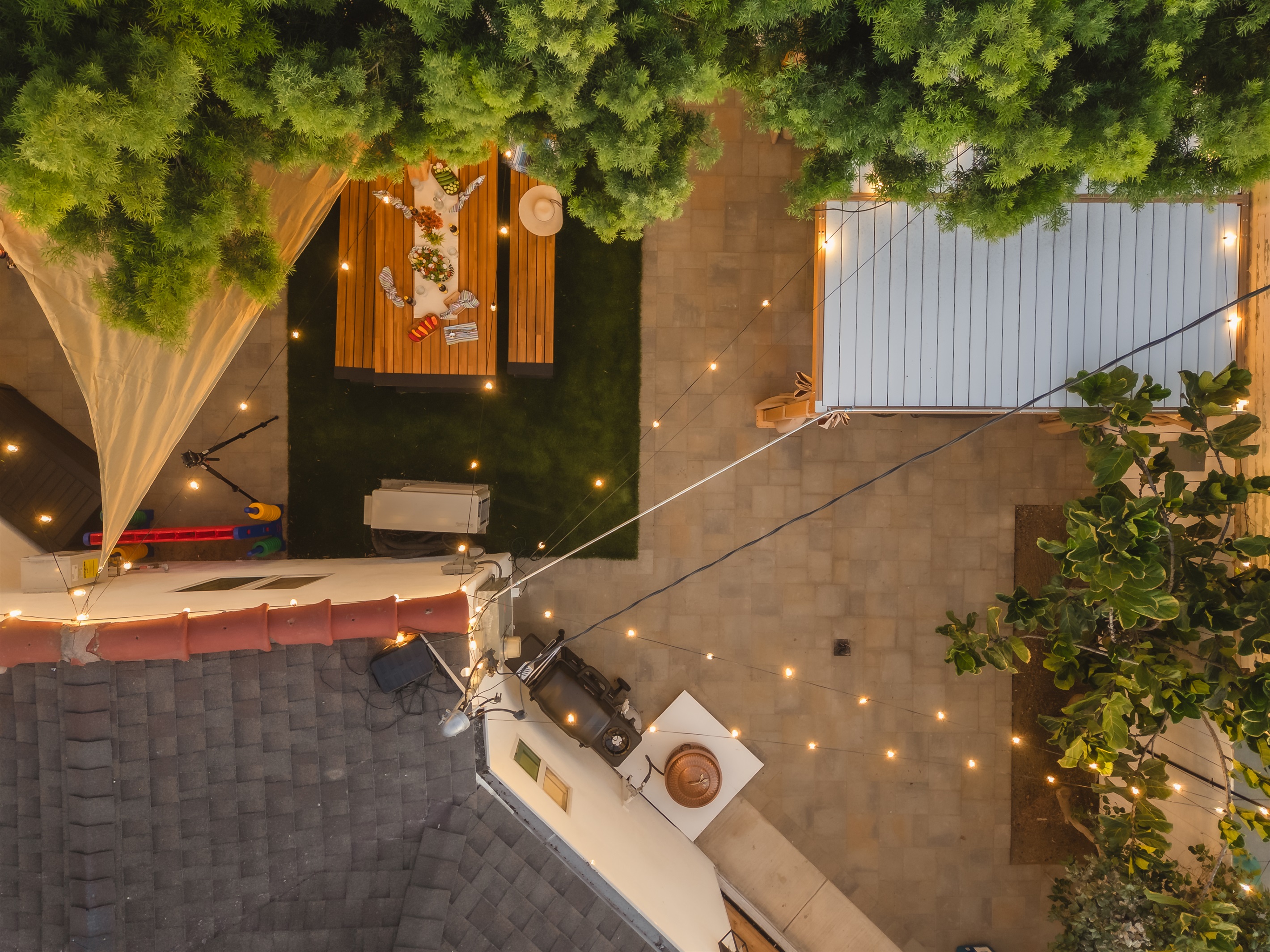 From grilling and dining under twinkling string lights to soaking in the hot tub or enjoying s’mores by the fire, this cozy San Diego backyard was made for memory-making. Kids can play while grown-ups relax, all in one inviting space.