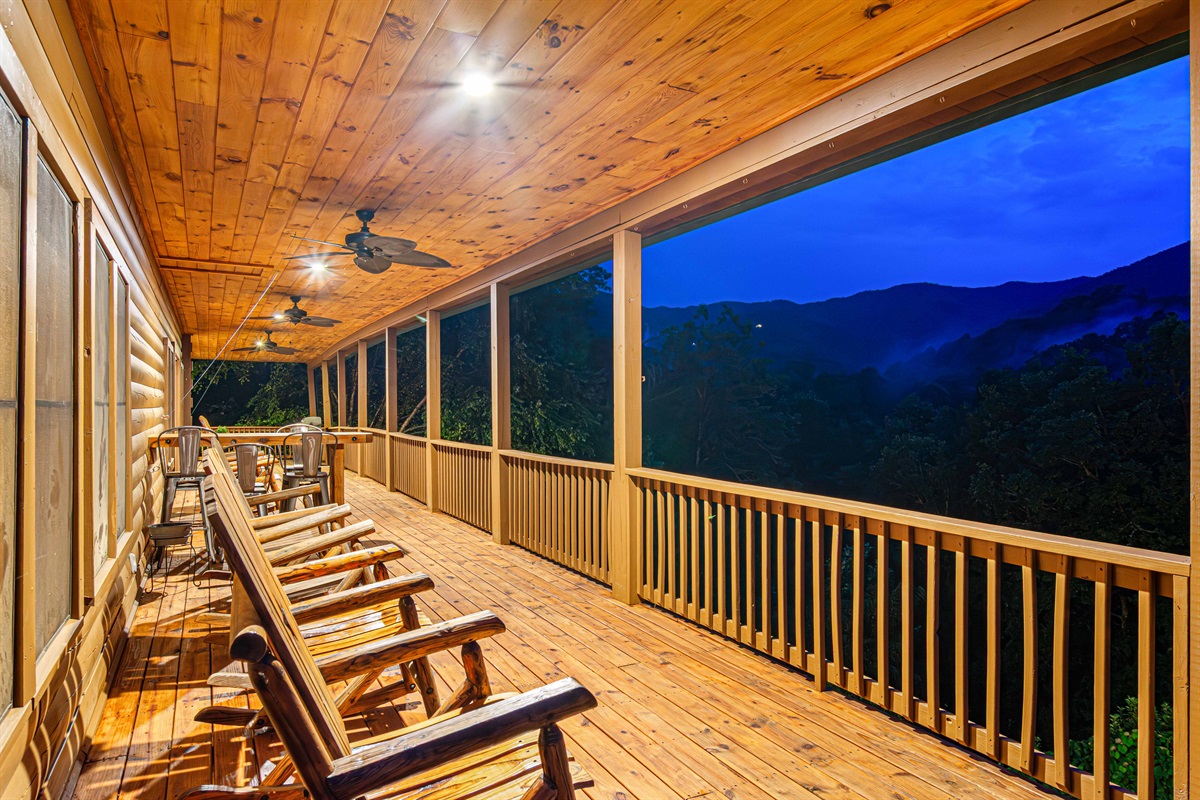 Porch Retreat: Enjoy stunning mountain views while rocking the night away in style!