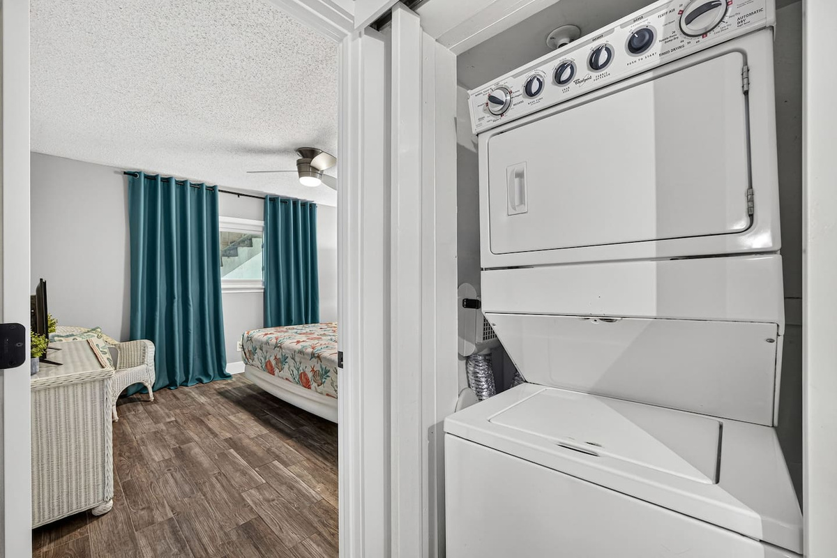 Laundry (washer and dryer) located near back of unit by 3rd bedroom