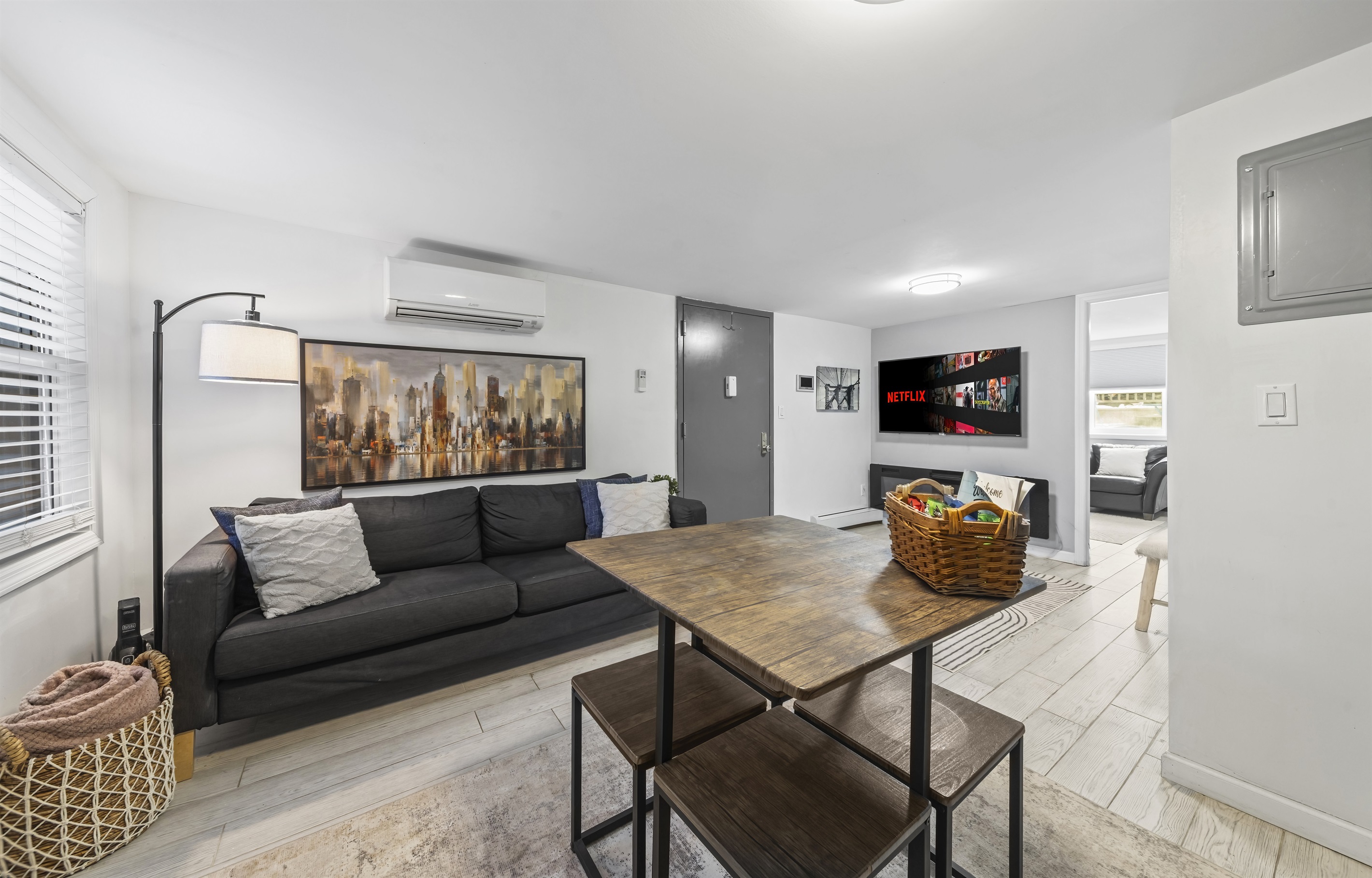 Settle in for movie nights, good conversation, or quiet downtime in a living room designed for easy city living.