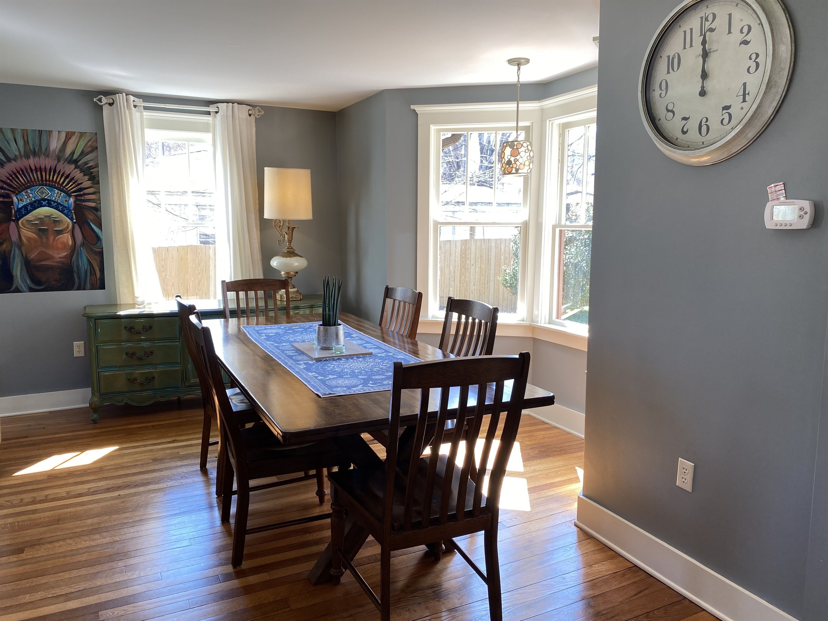 Large dining table comfortably seats 8 for sharing meals with your company