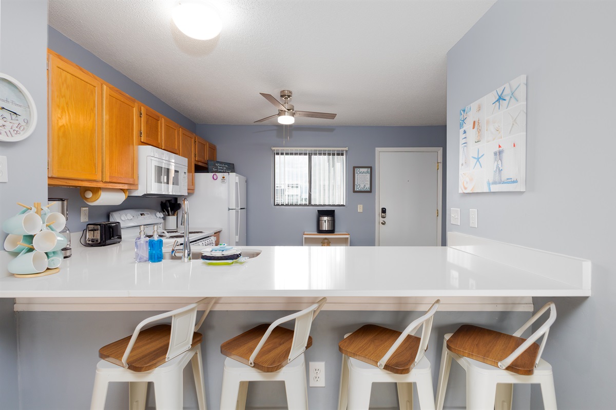 Bar area with seating for 4