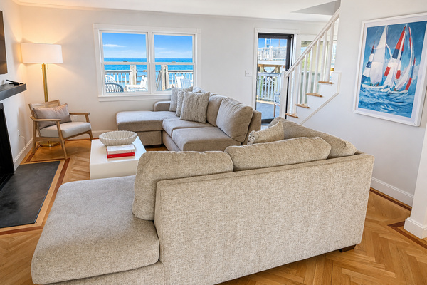 Bright, comfortable living space with ocean views and plenty of room to relax after a day at the beach.