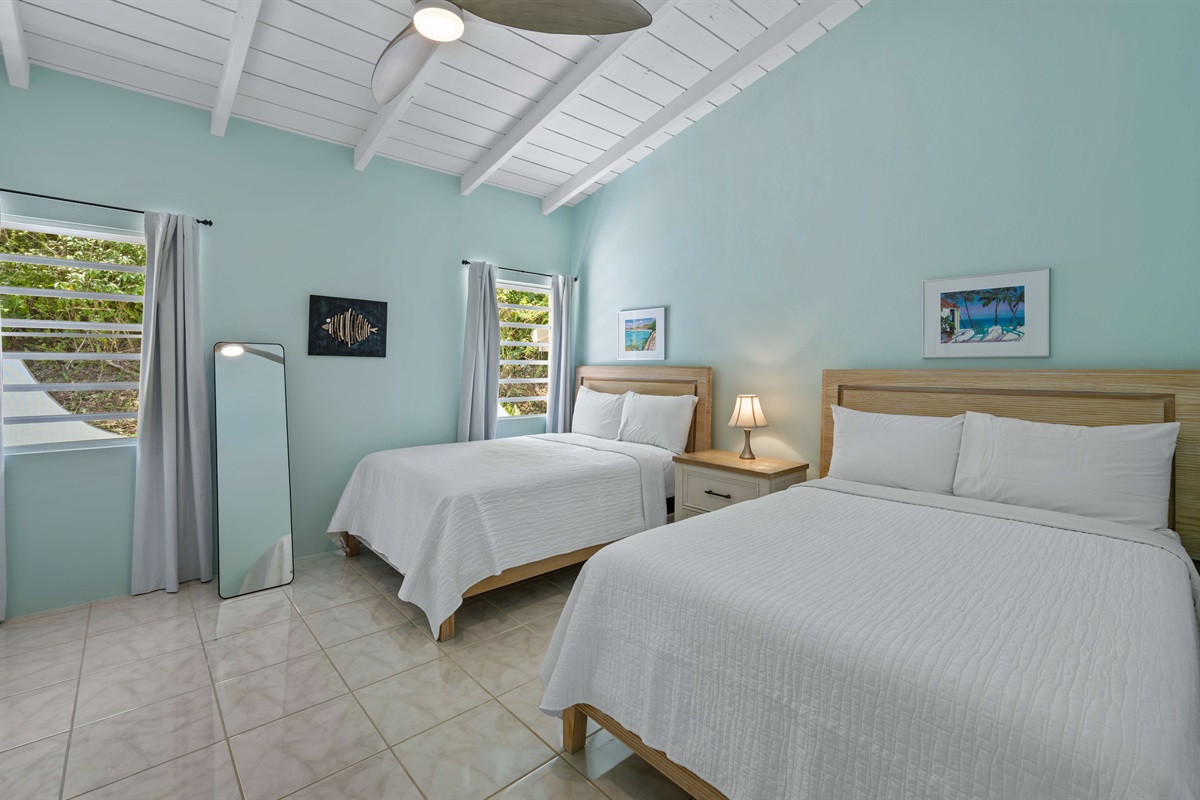 Guest bedroom 2 with two full size beds