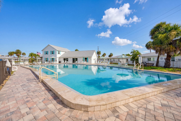 The large heated community pool is perfect for a refreshing swim or a relaxing afternoon in the Florida sunshine.
