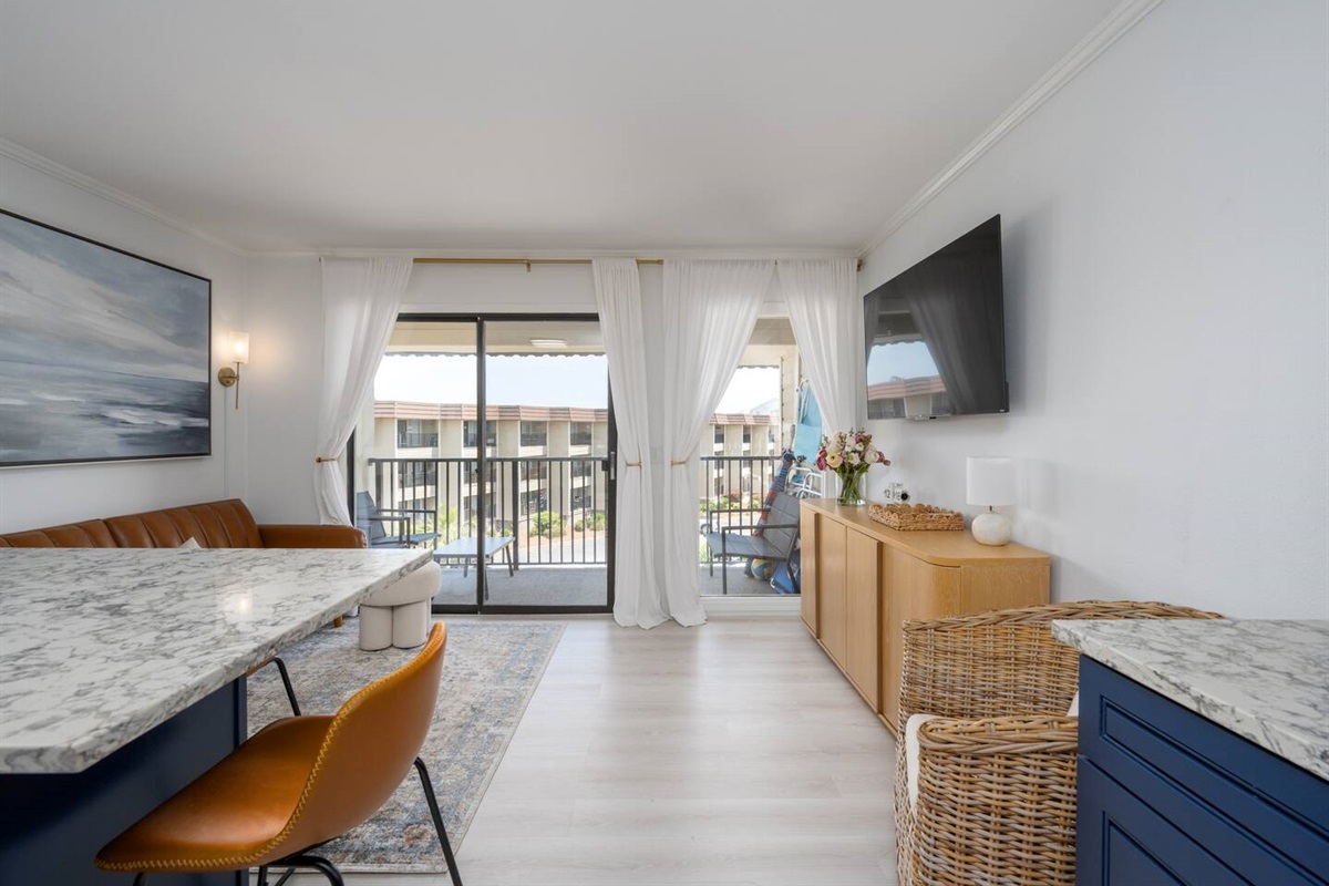 View of the balcony located off of the Kitchen and Living room.