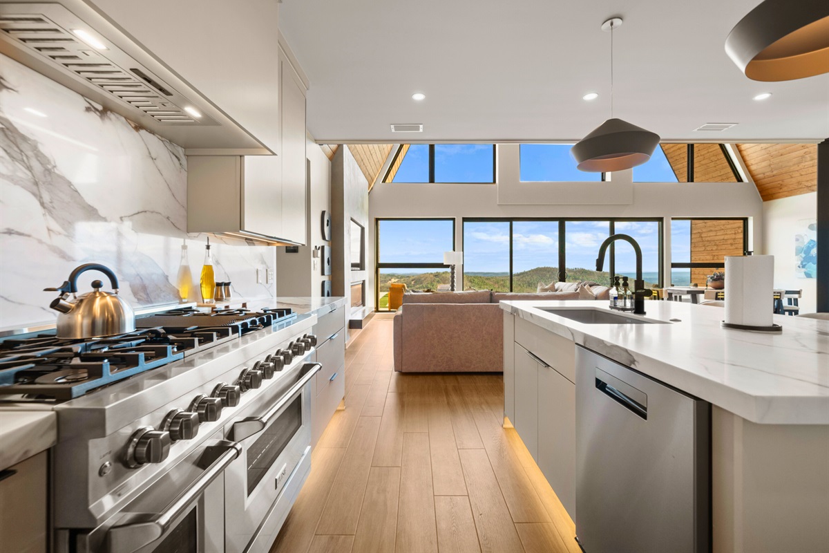 Hosting is a breeze in this beautiful kitchen, with plenty of space to prep, serve, and gather while still feeling connected to the rest of the home.