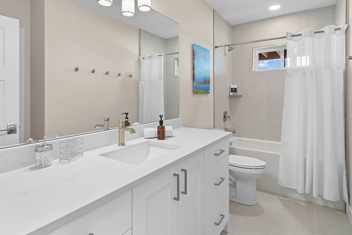 Jack-and-Jill bathroom shared between bedrooms 3 and 4.