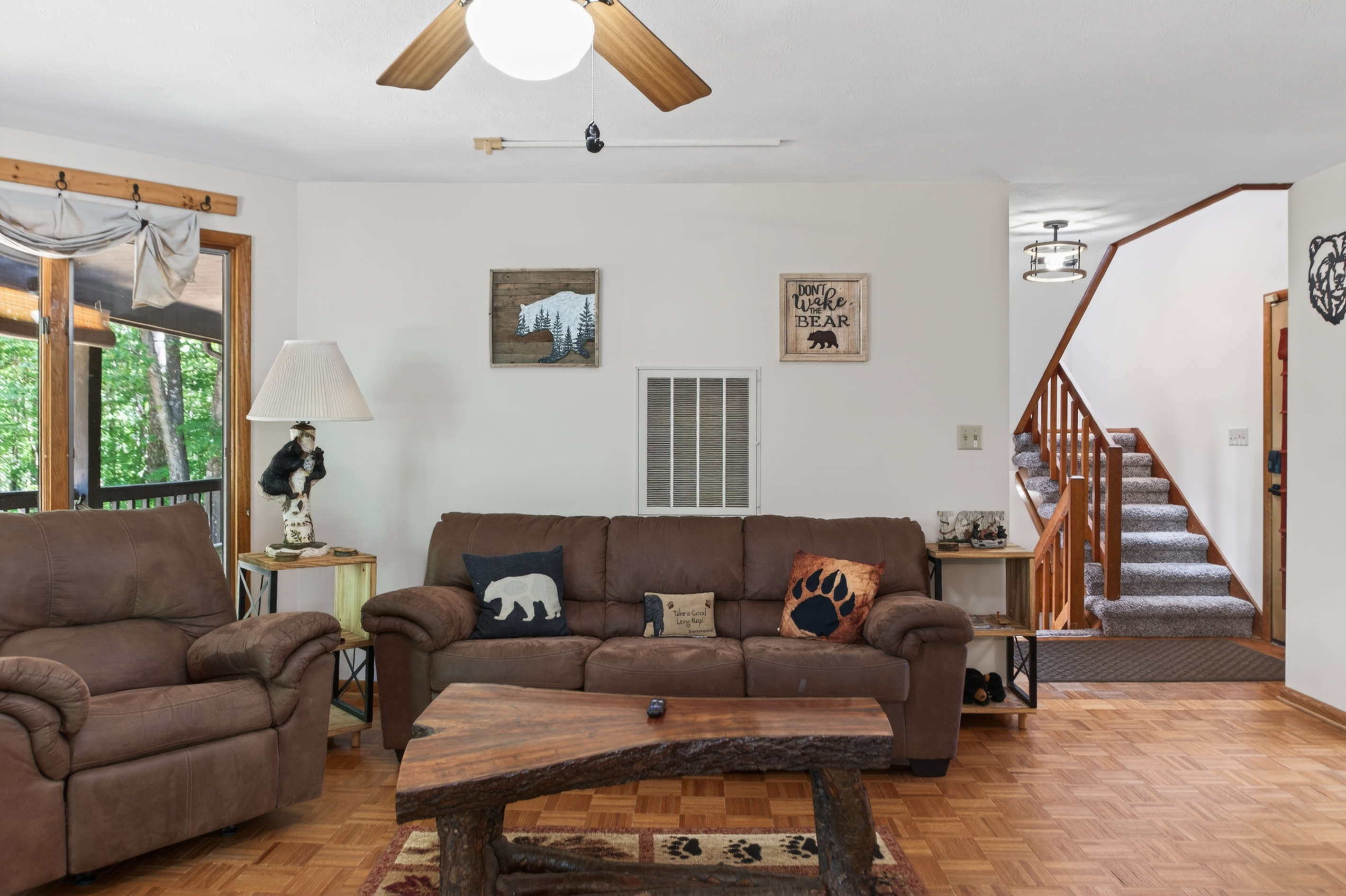 Living Room: Embrace nature vibes in a spacious space, adorned with rustic decor and comfy seating!