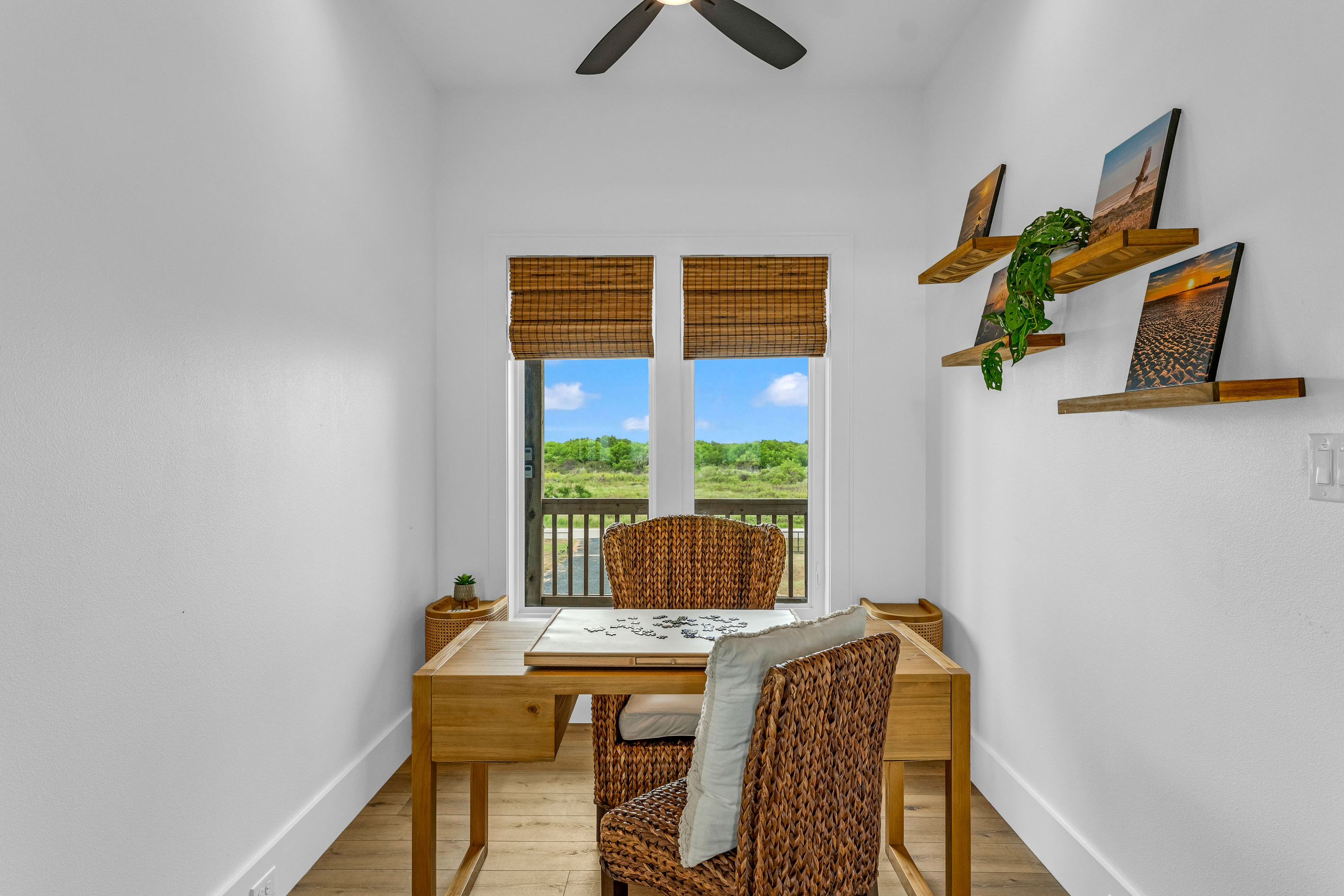 Cair Paravel: A quiet workspace with a desk and woven accent chairs makes this a great spot to catch up on email before heading to the beach.