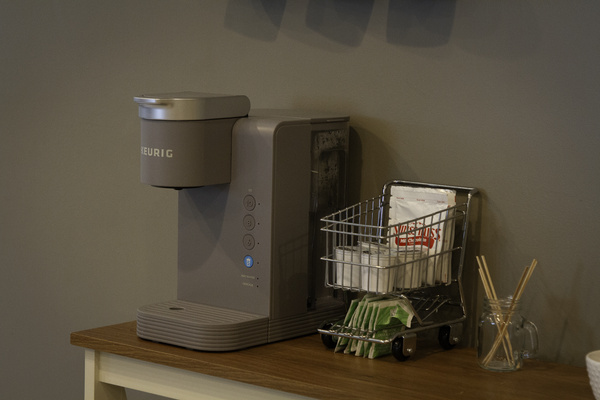 A view of the coffee bar/the coffee maker has been updated