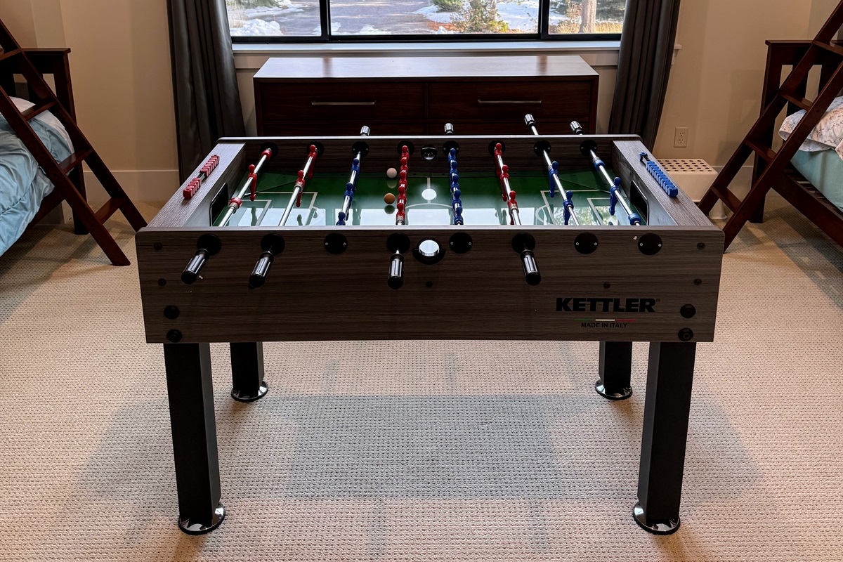 2nd floor bunk room has a foosball table