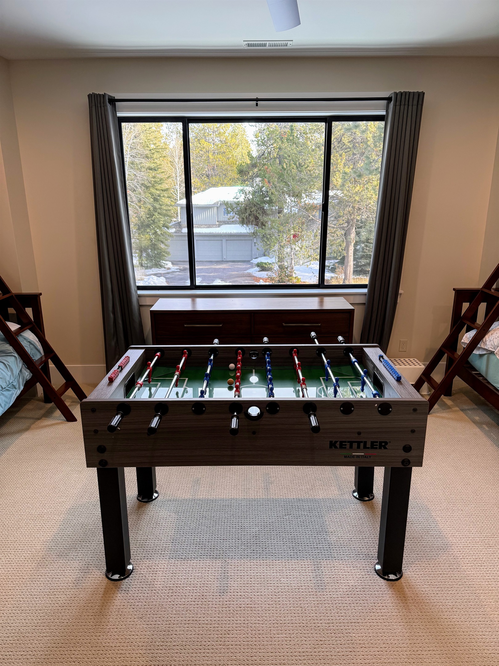 2nd floor bunk room has a foosball table