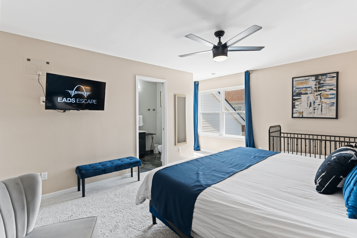 This 2nd king bedroom features clean lines, warm lighting, and a full ensuite bath for ultimate convenience.
