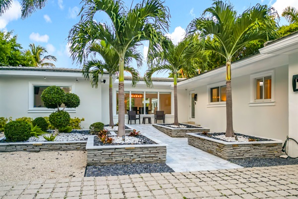 Easy access to the one floor house. At night it is lit up nicely. 