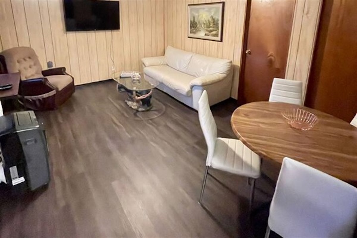 Open living and dining space with comfortable seating
