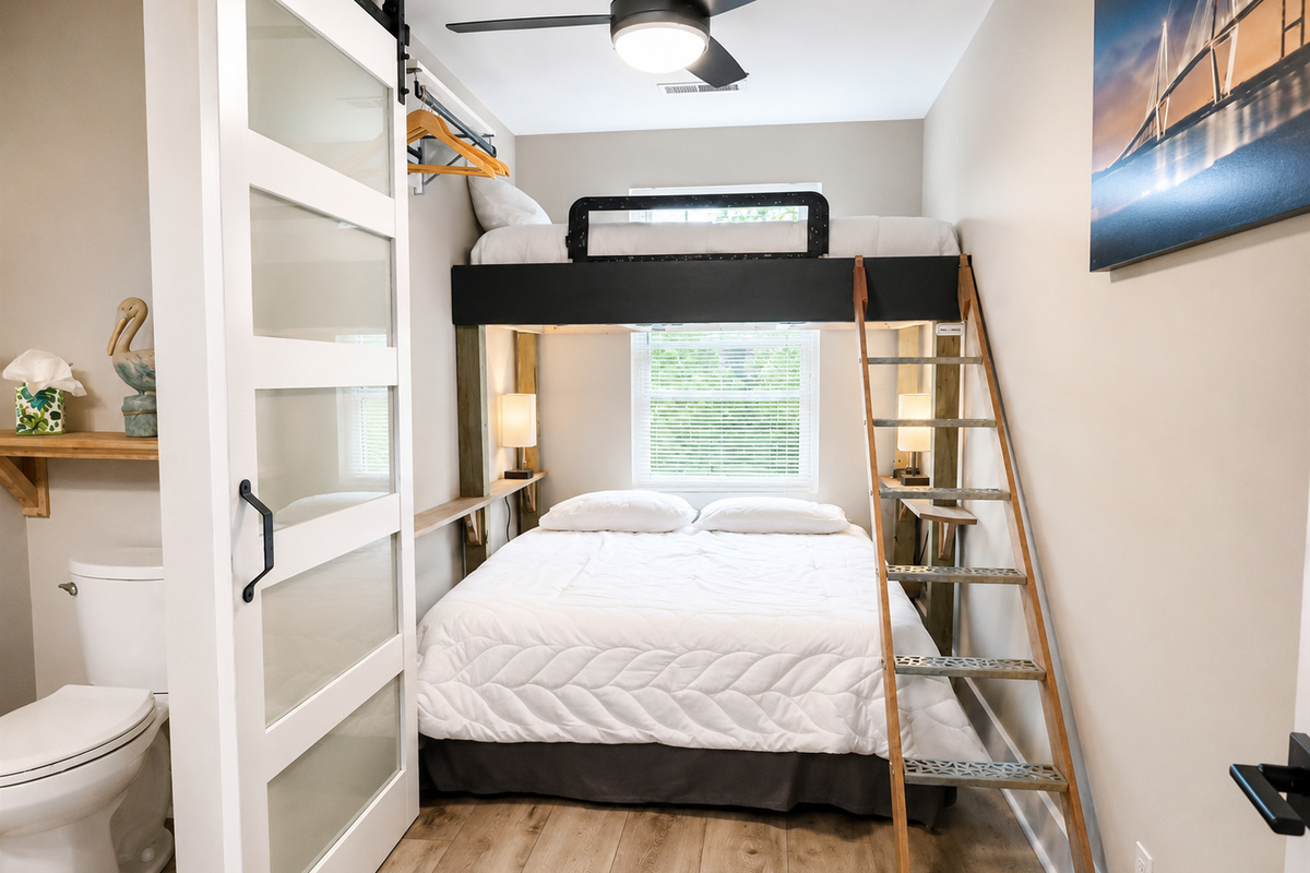Second bedroom with half bath, queen and twin bunks