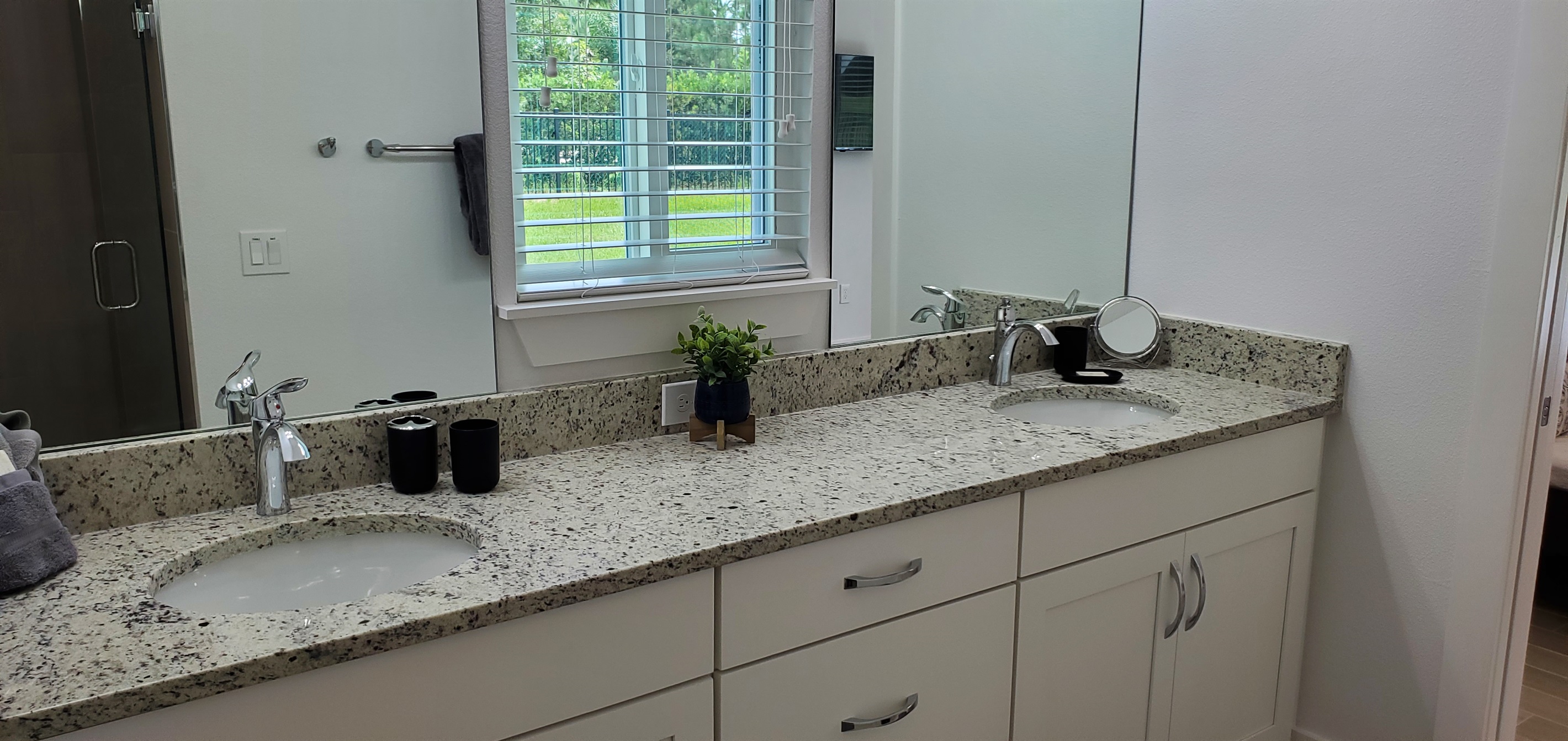 Master King bathroom with double sinks