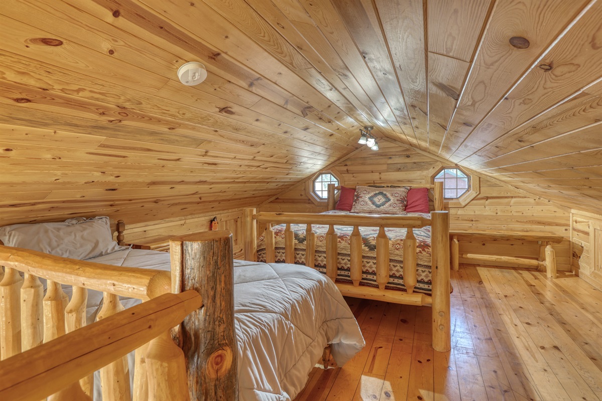 Loft area with 1 Queen bed and 2 twin beds