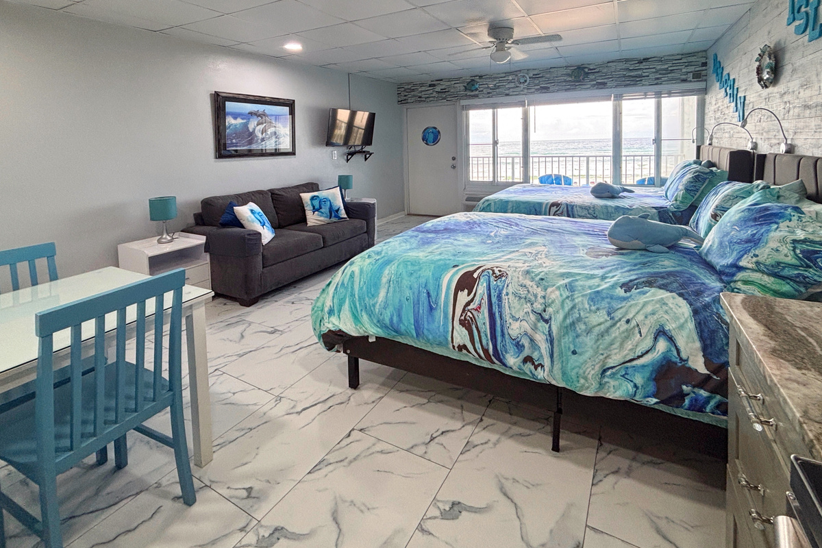I won't be sitting here much wiith that water view! Sitting area and large screen TV.