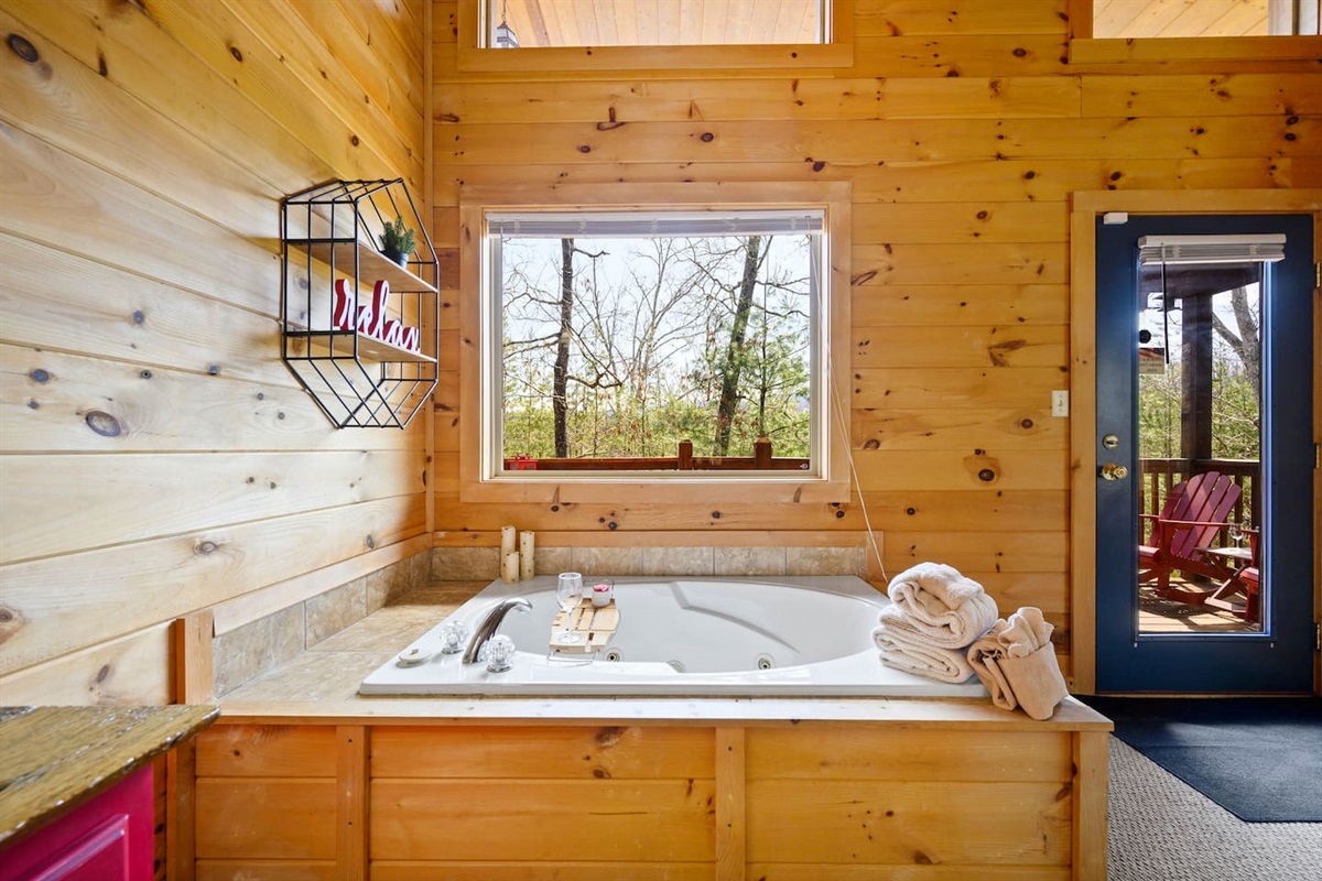 Tall ceilings, an exit to the back patio and hot tub, just perfect.