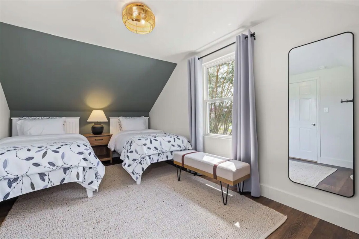 Bedroom #5 includes 2 twin beds + a toddler bed, dresser, full length mirror