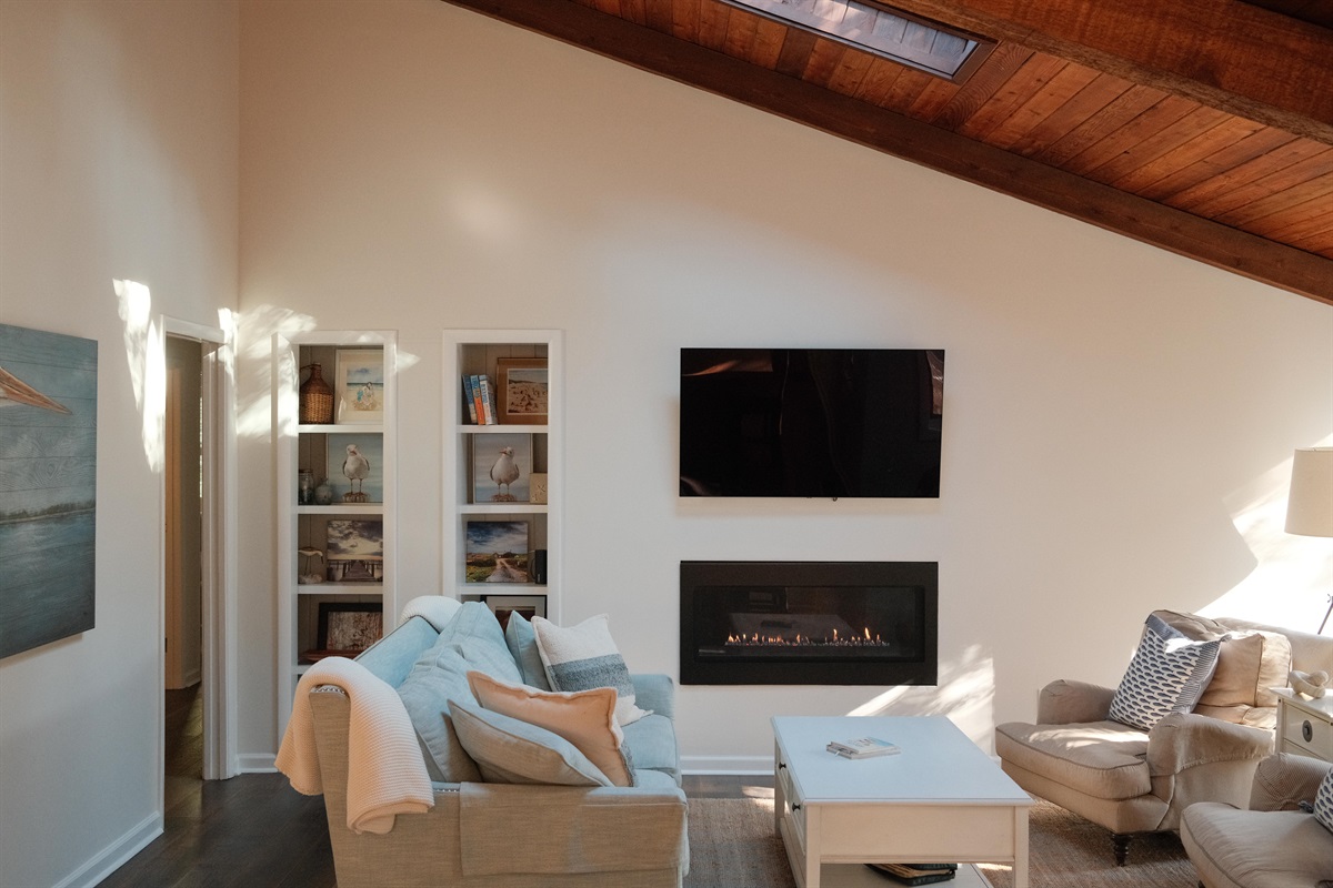 Plenty of space to relax after an OBX beach day. Vaulted tongue and groove ceilings with skylight - obx charm. 