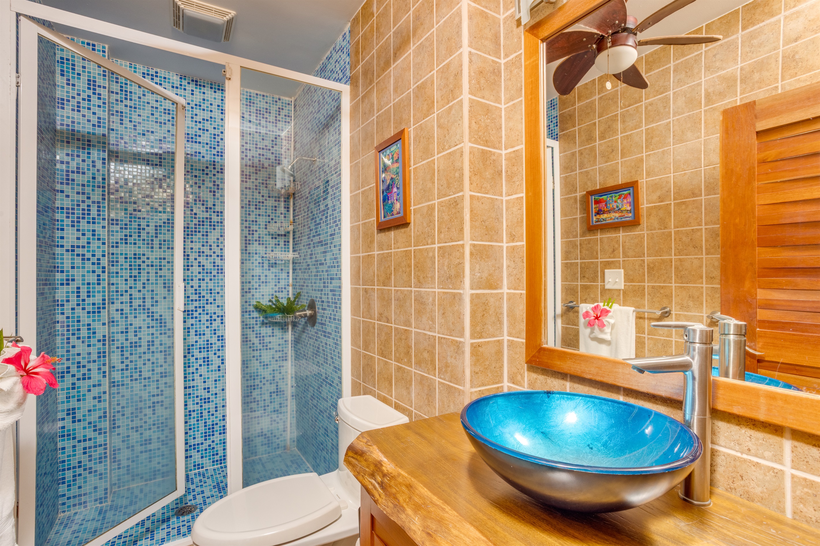 Second full bathroom located in bedroom hallway on second floor .