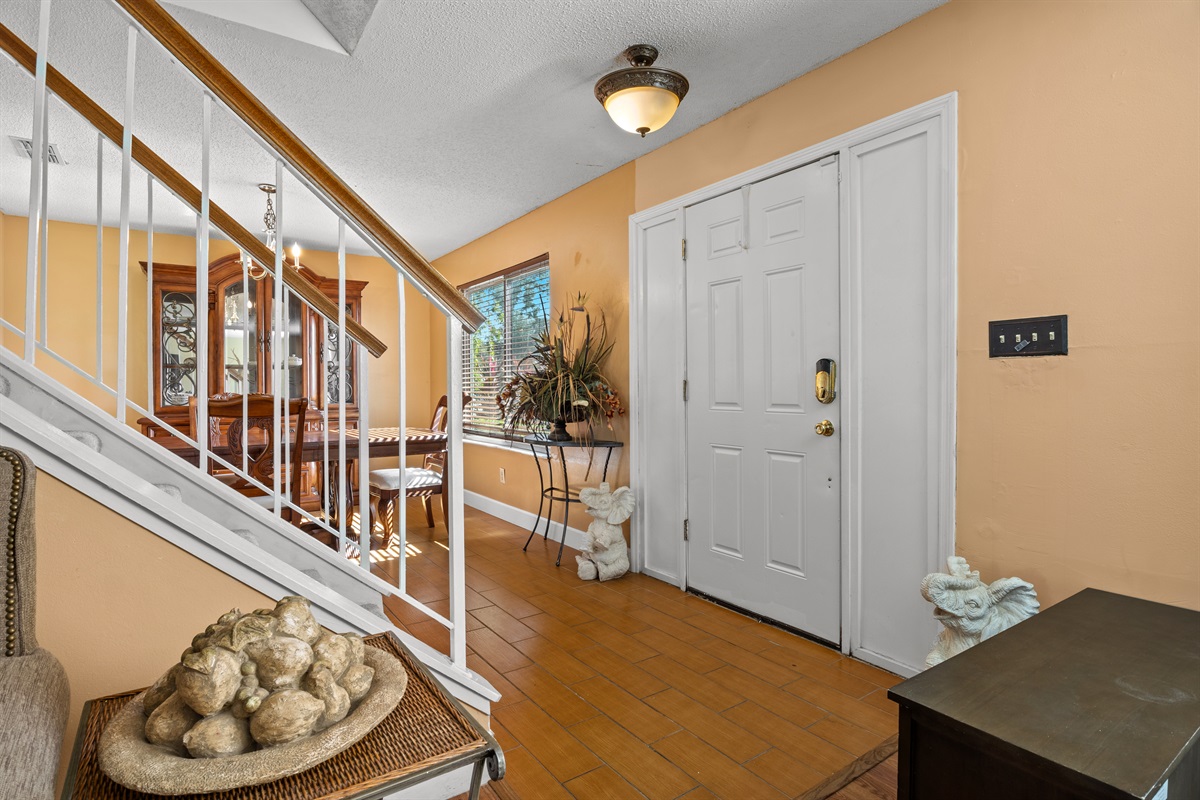 When you enter the front door you may walk left into the living room. Or right into the dining room.