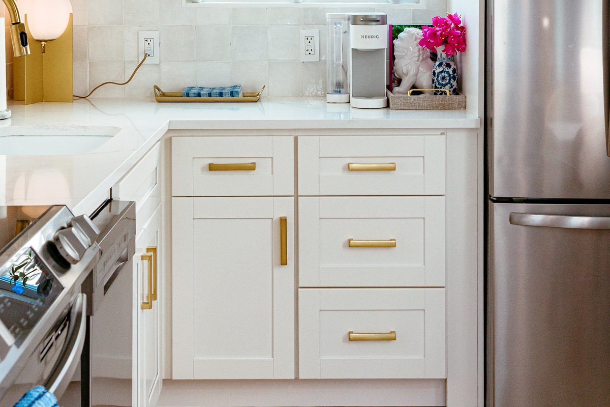 The full kitchen in the cottage has all the cookware and amenities you need to craft tasty meals together.