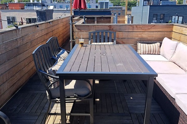 Private rooftop with NYC views of World Trade Center, Empire State building, etc.