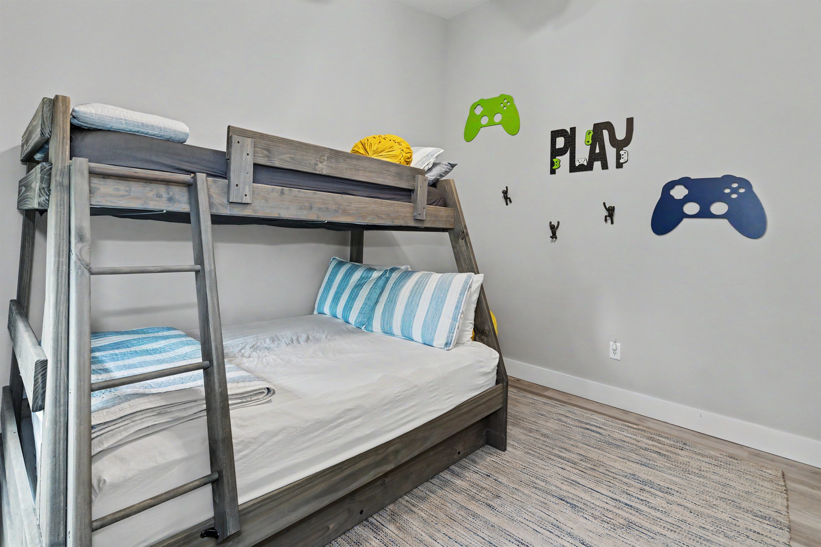 Kid-approved bunk room with a twin-over-full bunk + trundle for extra guests and extra fun!