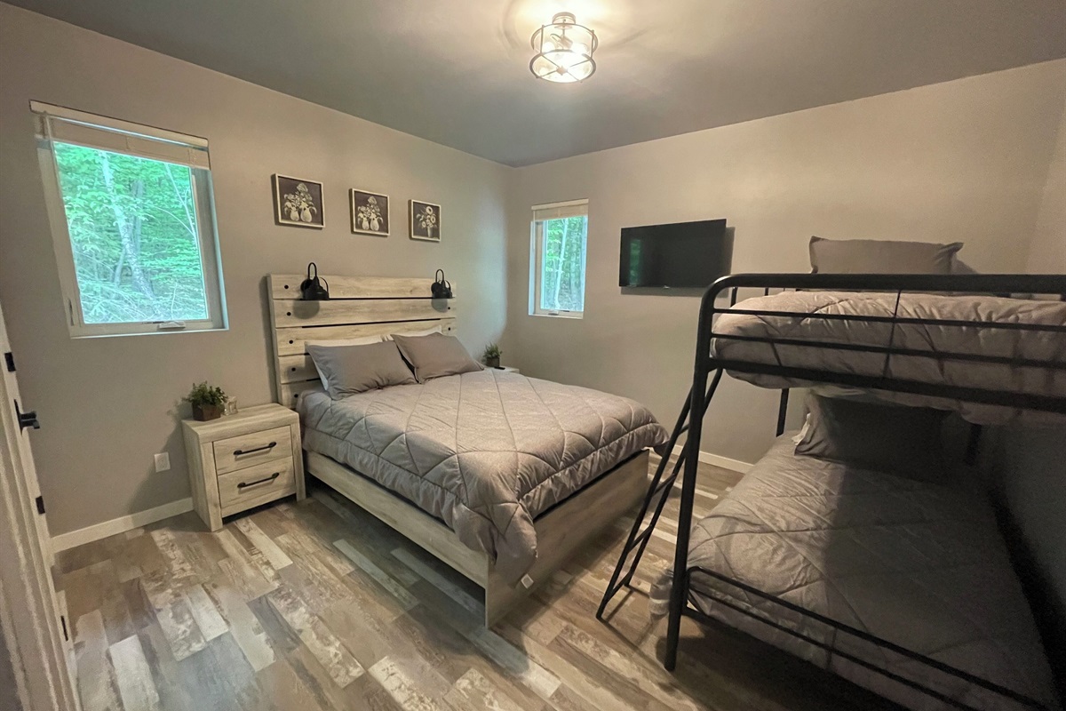 House 1 - bedroom 3 with queen bed and twin bunk beds