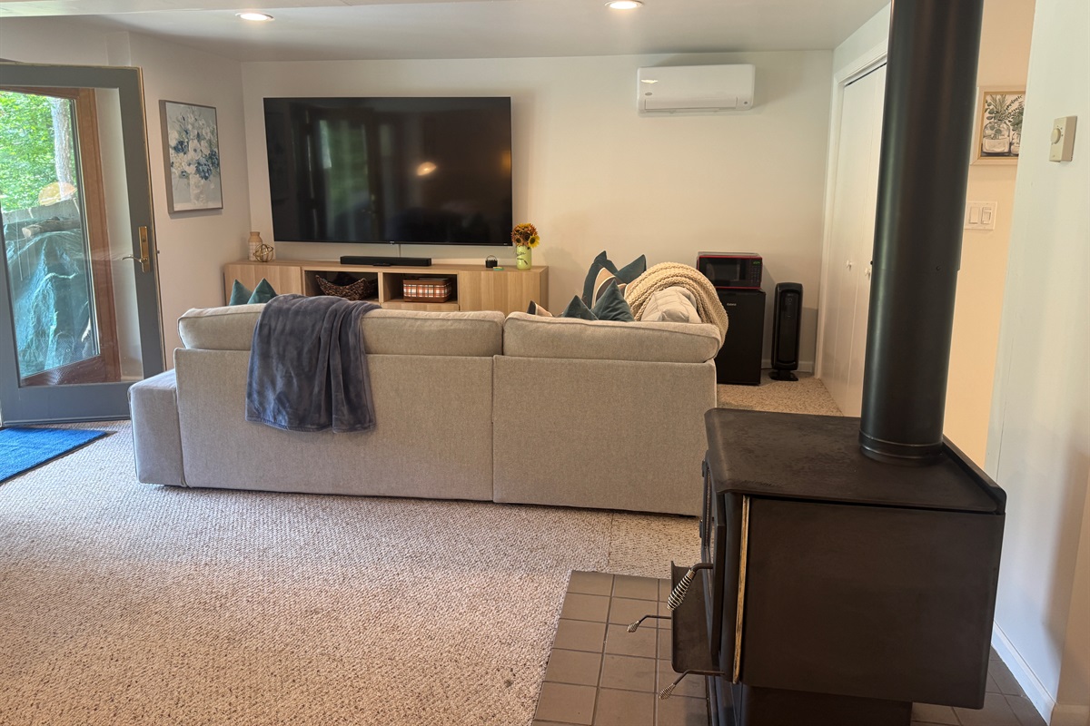 Comfy couch and an 85" SmartTV