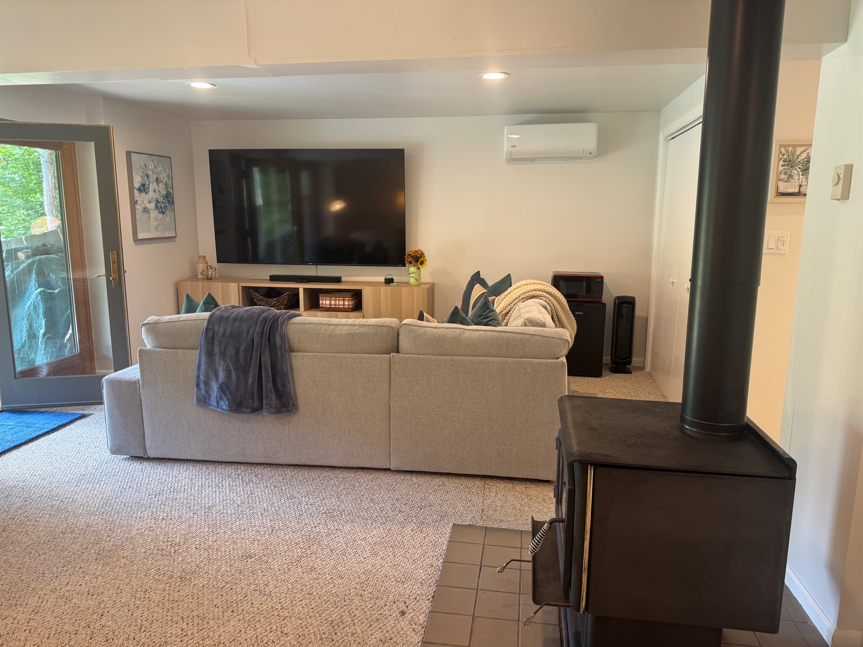 Comfy couch and an 85" SmartTV