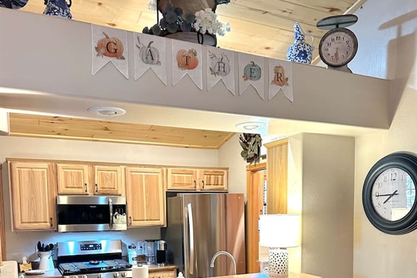 Bar-style seating makes it easy to visit while preparing meals.