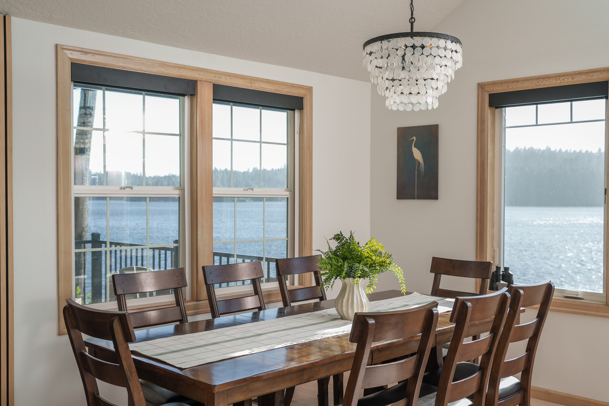 Gather around the dining table as sunlight pours through the windows and Woahink Lake stretches out before you—the perfect setting for slow breakfasts, shared meals, and memorable conversations by the water.