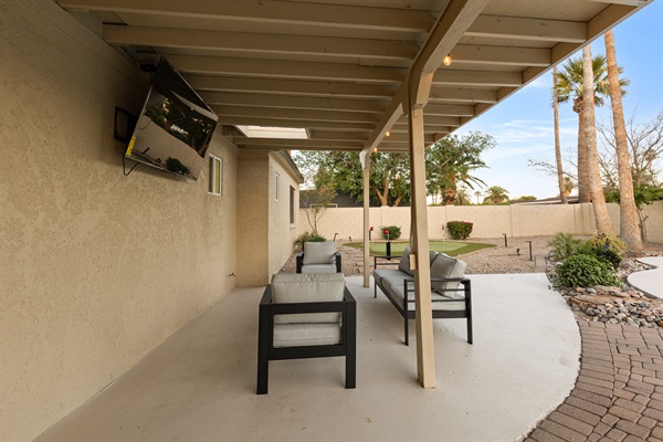 Backyard living space with smart television