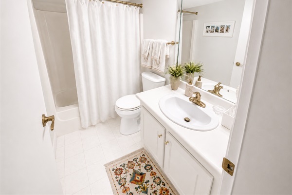 Bathroom 2 has single sink, tub/shower combo .  Plenty of towels, paper products, and toiletries in our units.  