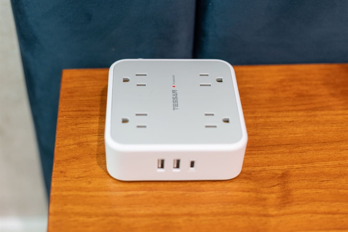 Bedside charging station with USB ports for added guest convenience.