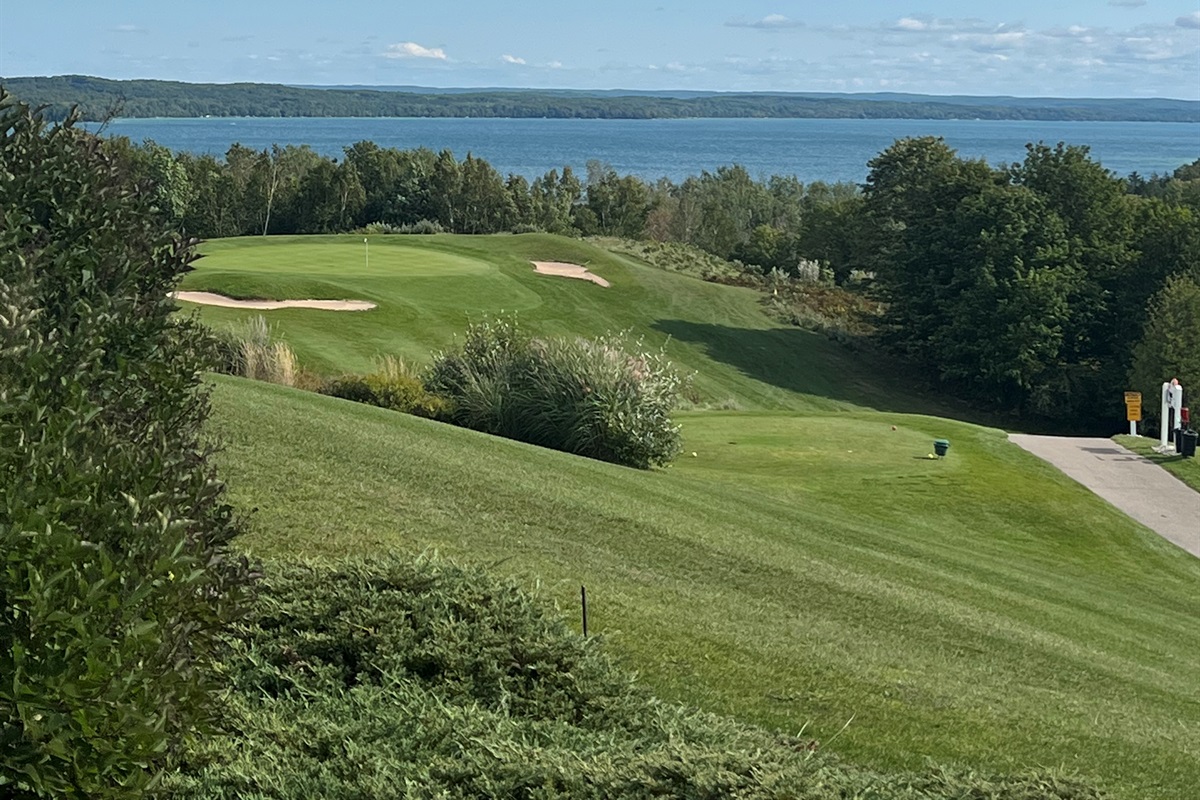 Plan a day of golf at A-Ga-Ming Golf Course overlooking Torch Lake and Lake Michigan, or just grab a bite to eat with these views!