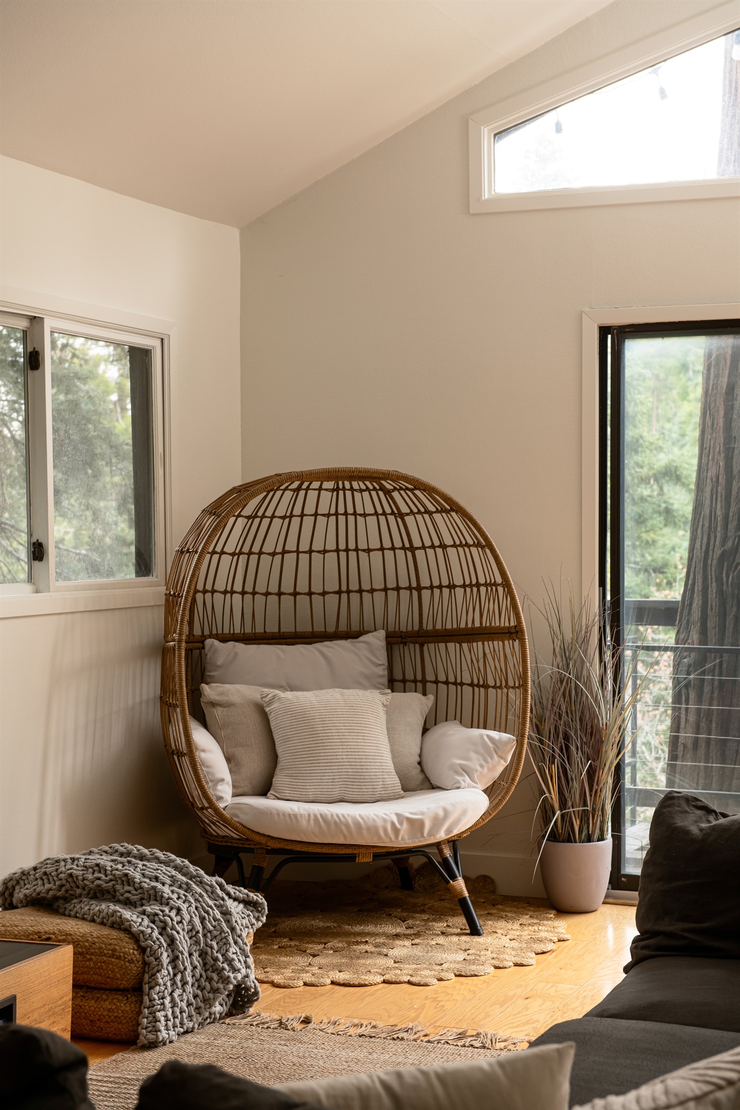 Cozy reading nook with lounge chair and natural light—perfect for relaxing with a book, morning coffee, or unwinding during your mountain getaway