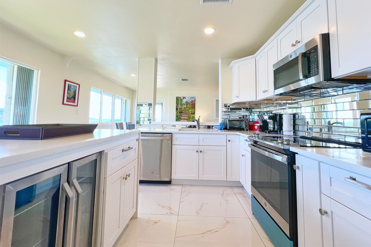 A fully equipped kitchen with modern appliances makes cooking (or reheating leftovers) easy.