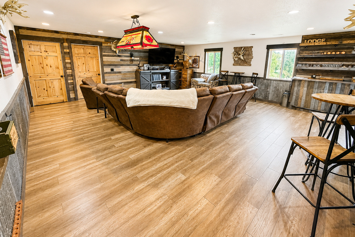 Spacious main gathering area with comfortable seating, rustic Northwoods character, and plenty of room for family and friends to relax together after a day of exploring Birchwood.