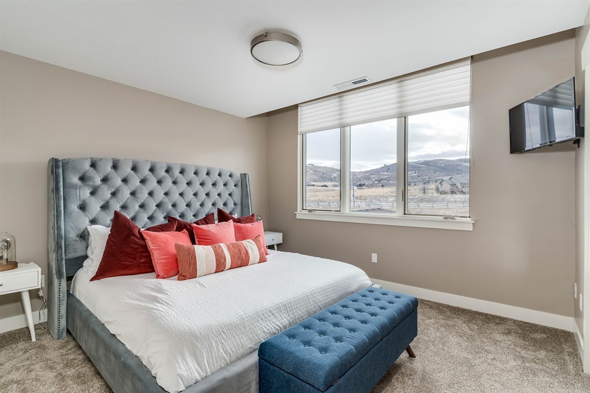 Upper-level king bedroom with ensuite—comfort and privacy combined