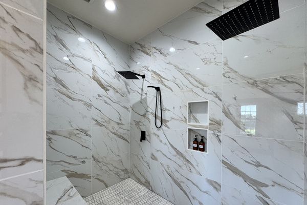 Main ensuite walk-in shower with dual shower heads. 