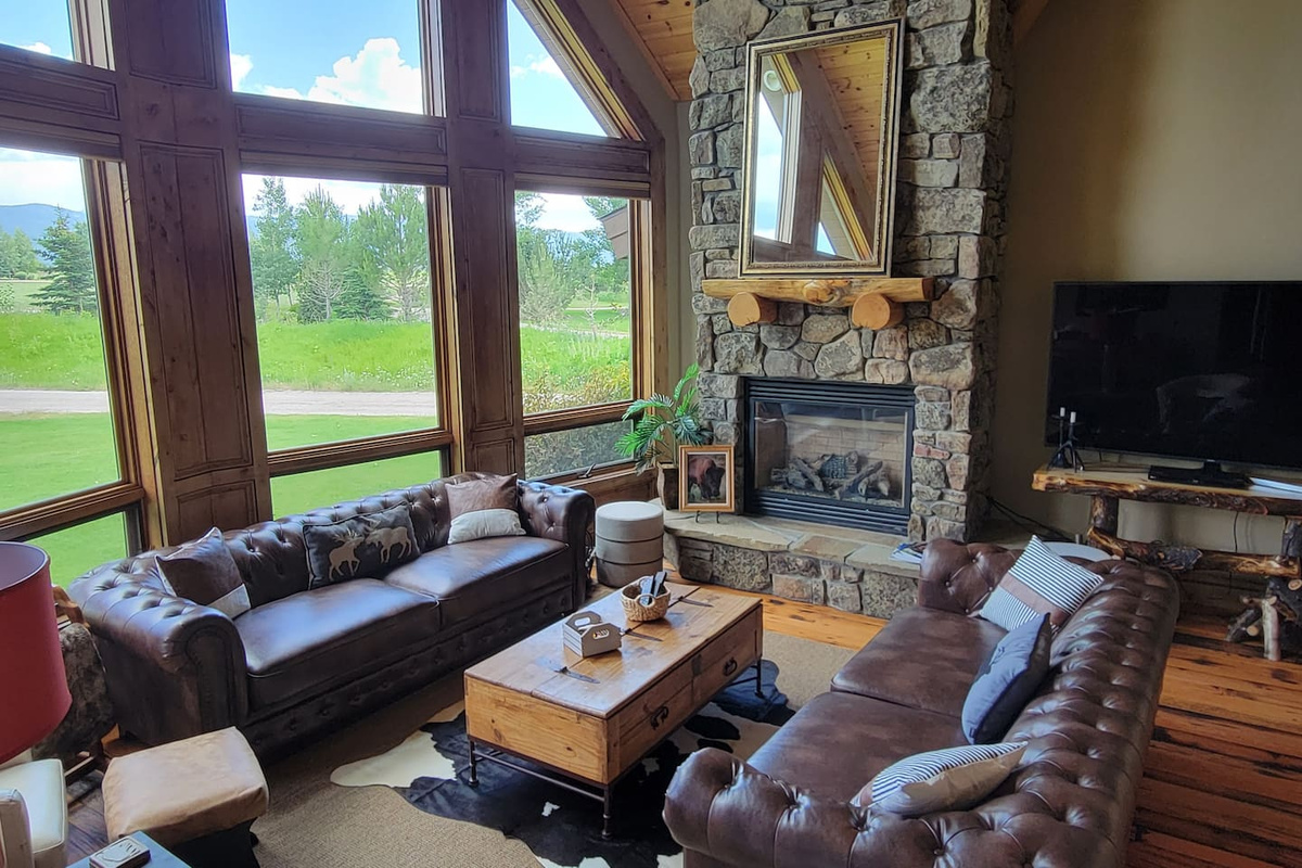 The view of the Tetons is spectacular from the living room!  Curl up with a book and blanket, or sip your coffee while watching the sunrise!  