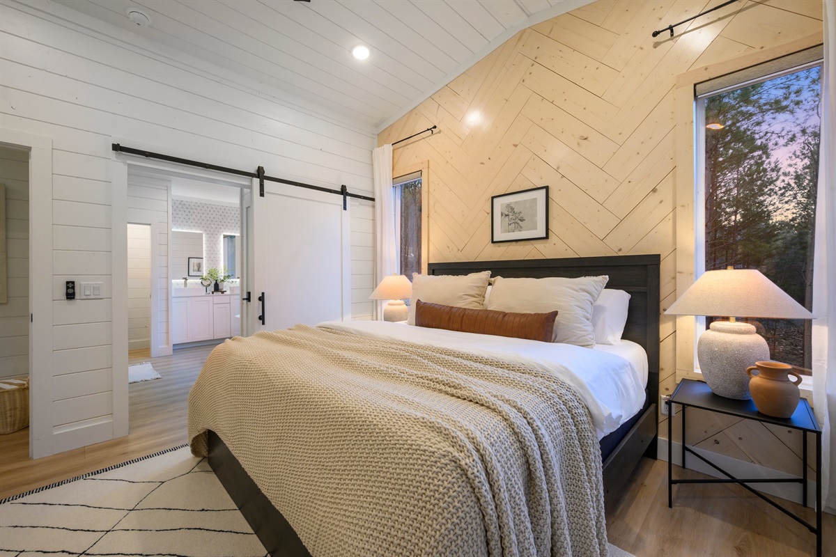 Wake up to natural light and the calming beauty of the surrounding woods.