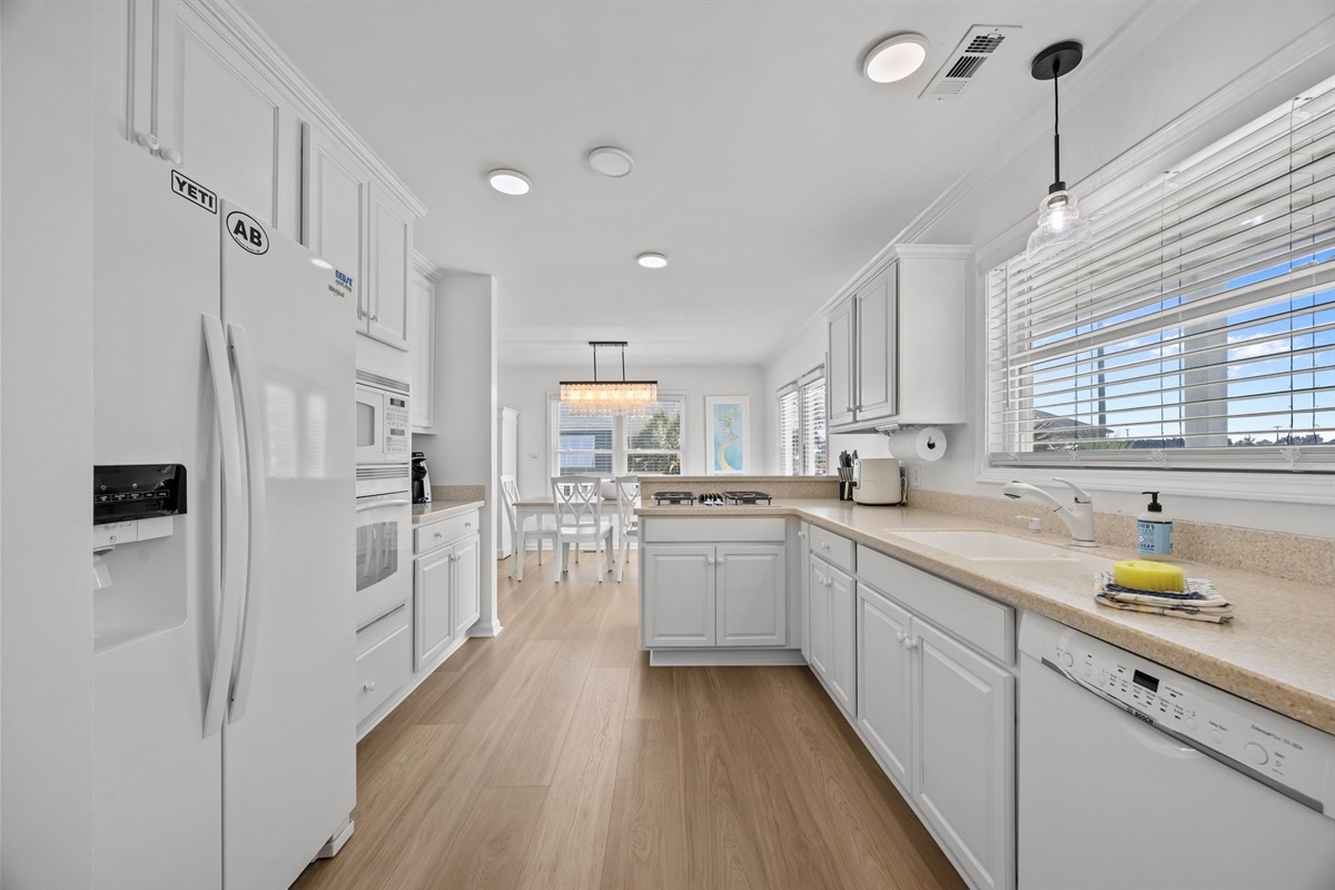 Spacious kitchen layout connected to the dining area for easy cooking and gathering